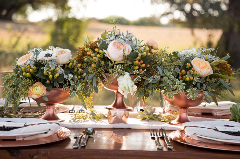 table centerpieces at a rustic wedding theme