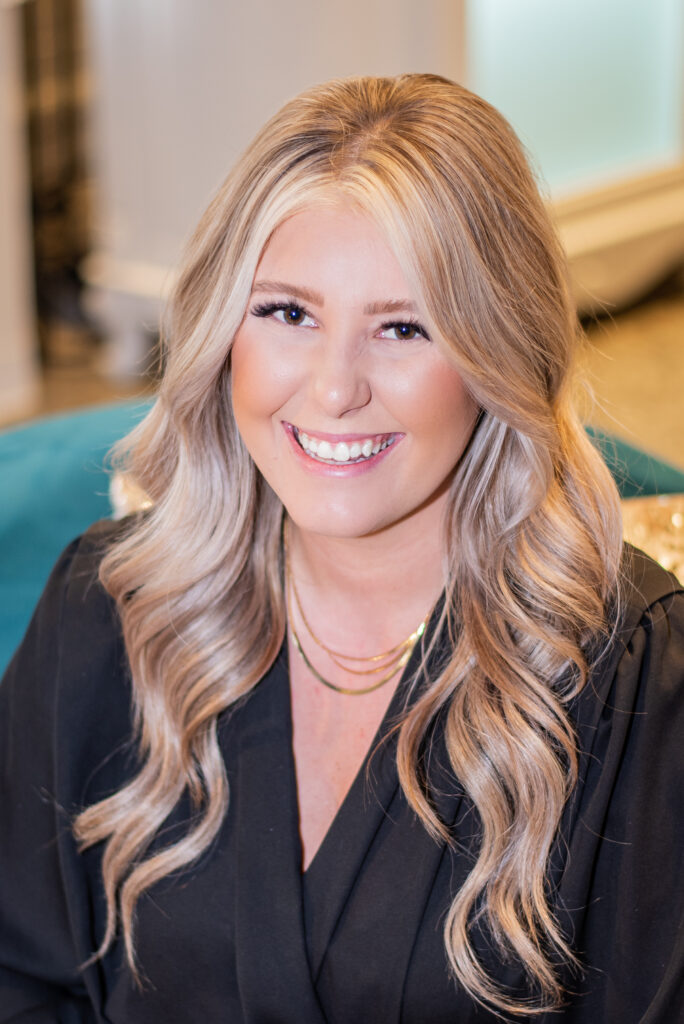 Headshot of Geena W, bridal consultant at The Wedding Shoppe