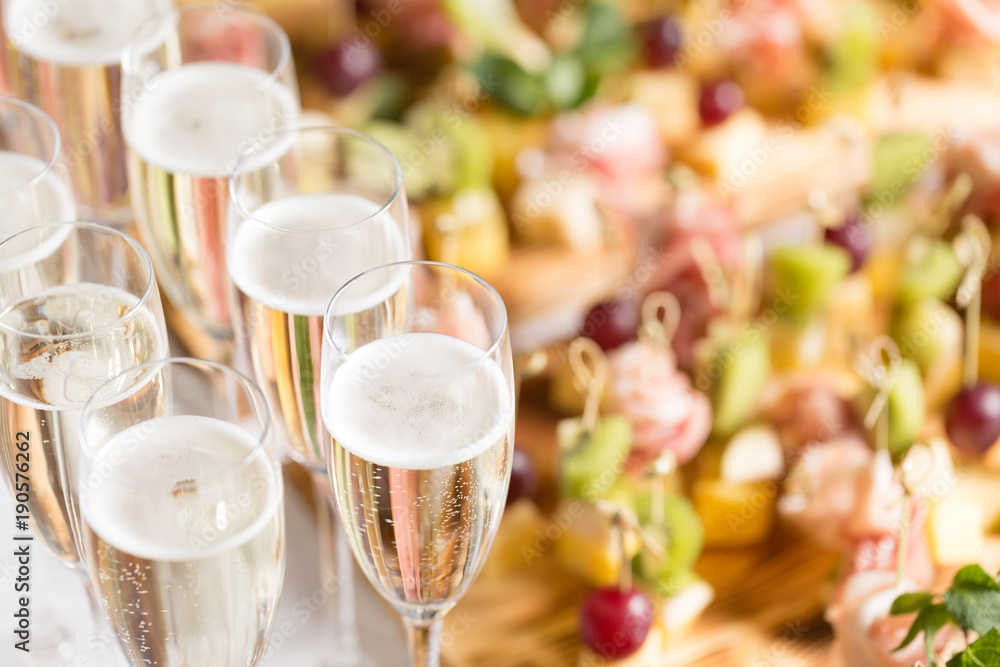 Champagne flutes and party appetizers