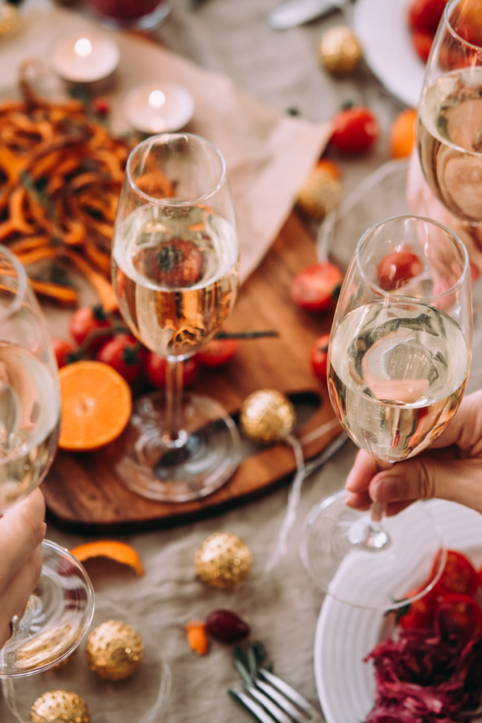 decorated table with autumnal colors and champagne glasses