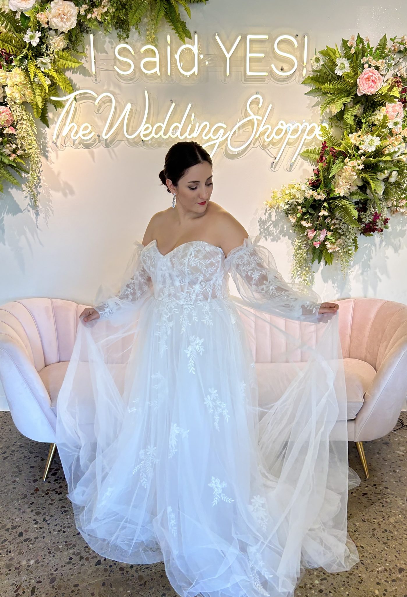 woman in white laced wedding gown with a sweetheart neckline