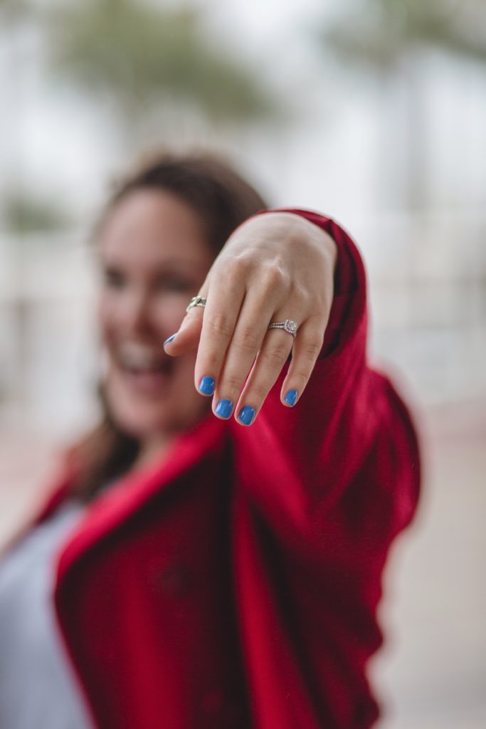 woman showing off blue fingernails