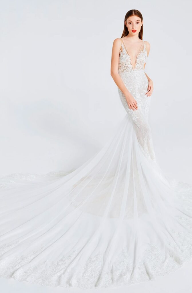 couture wedding dress with illusion bodice and plunging neckline