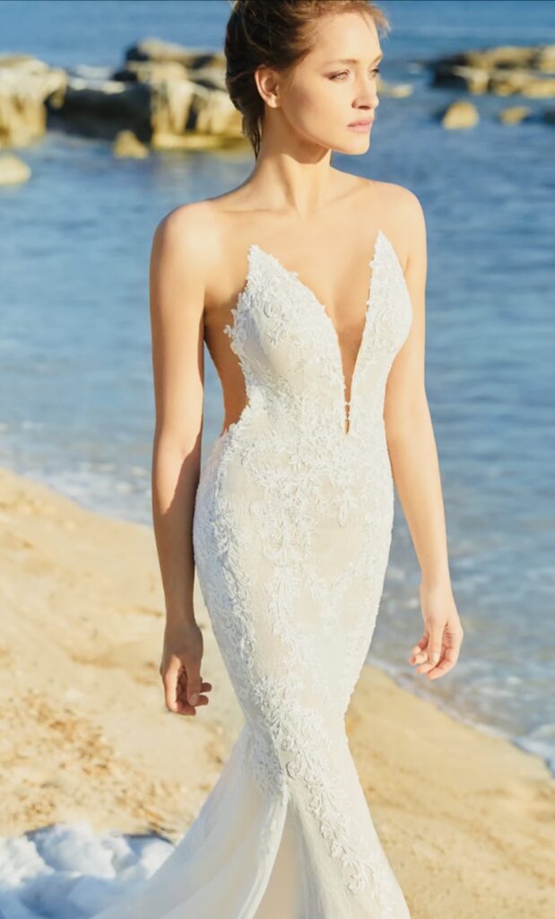 couture wedding dress with trumpet gown and plunging v-neckline