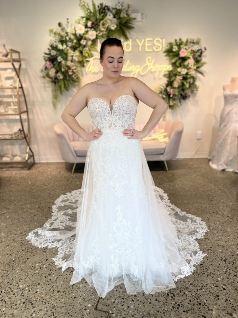Somerville dress worn by bride with strapless sweet heart neckline with a detachable skirt