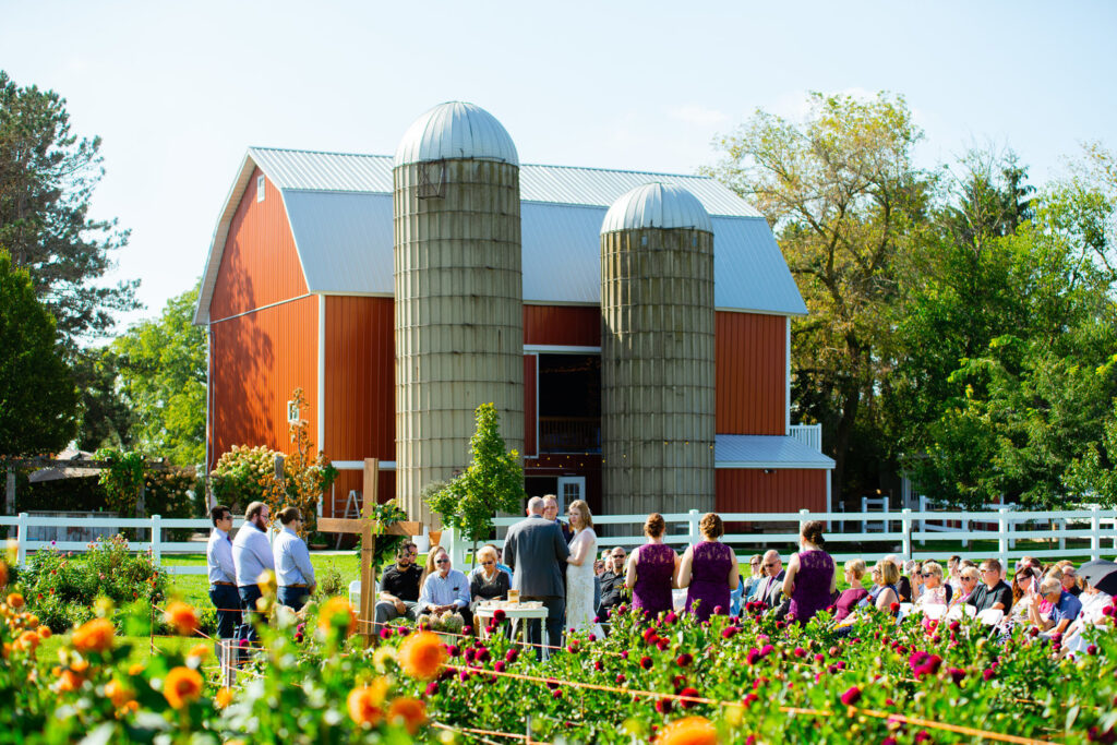 red barn with silos at a wedding reception at Wildwood Family Farms