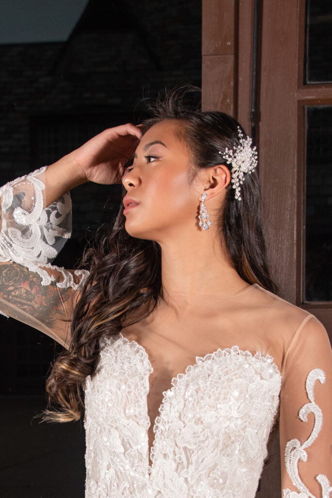 bride with dark hair has a beautiful crystal hair accessory