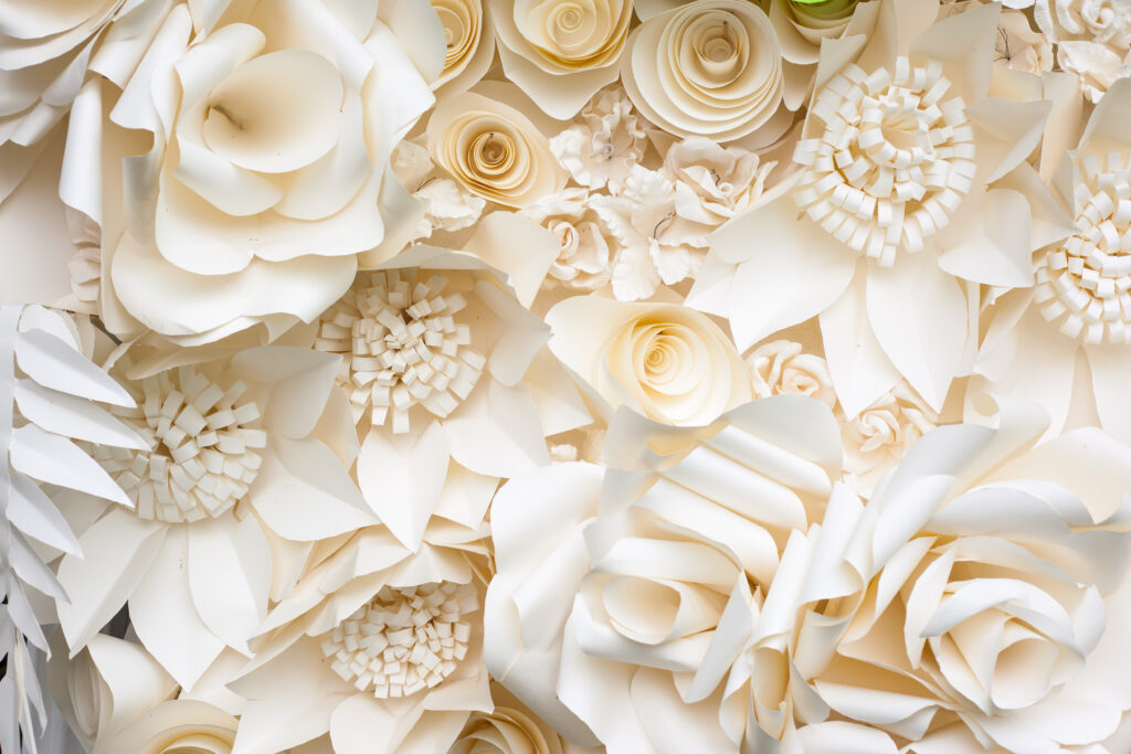 beautiful paper art with paper origami flowers for wedding photo backdrop