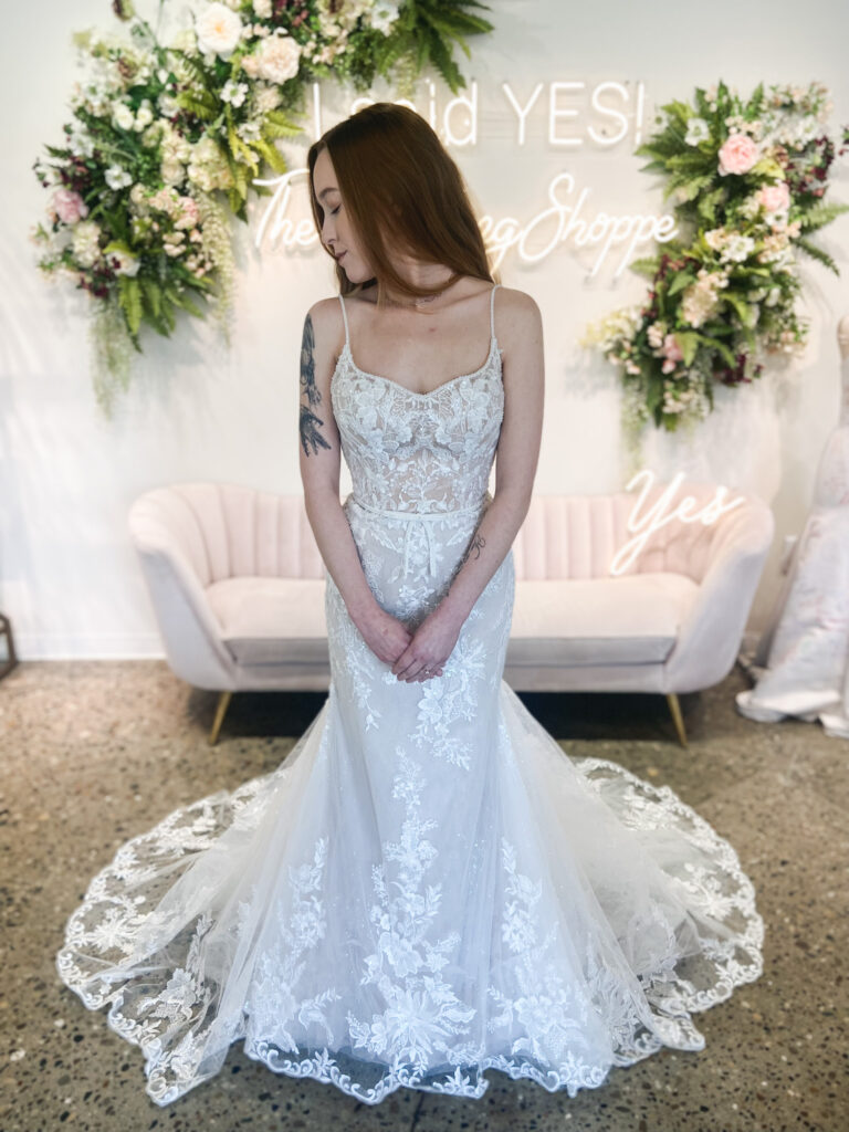 Janice is a gorgeous gown with all of sparkle tulle, beaded lace and a unique modest neckline