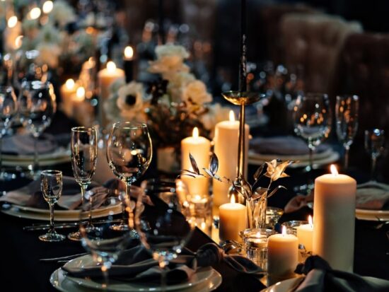 dark wedding decor with glassware and candles for a fall wedding