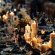 dark wedding decor with glassware and candles for a fall wedding
