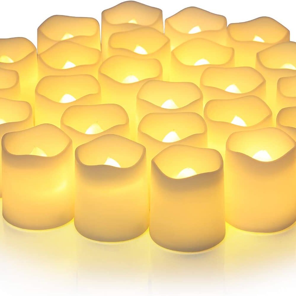 Group of flameless candles. The tops of the candles are wavy to imitate the burning of a real candle.