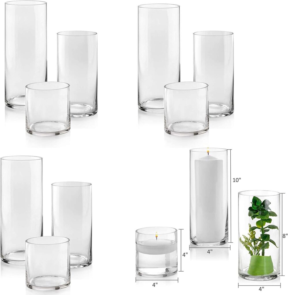 Set of glass cylindrical vases. They are set in groups of three with a tall, medium and small vase each.