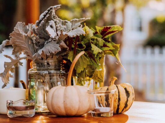 pumpkins and greenery decor set up for a fall wedding