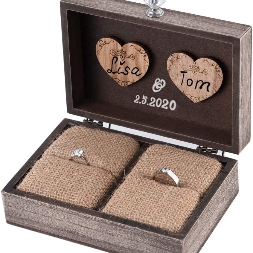 Rustic, wooden wedding ring holder box. The ring section is made of burlap.