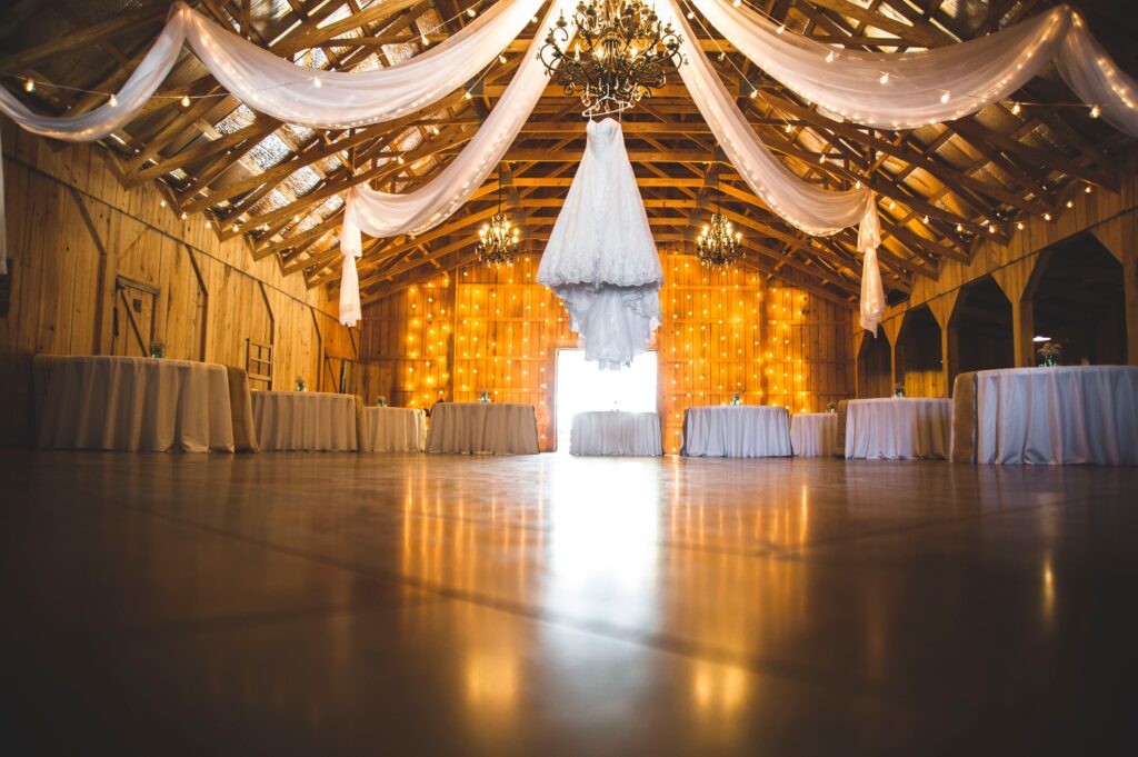 beautiful wedding venue with twinkling lights and a fall color palette