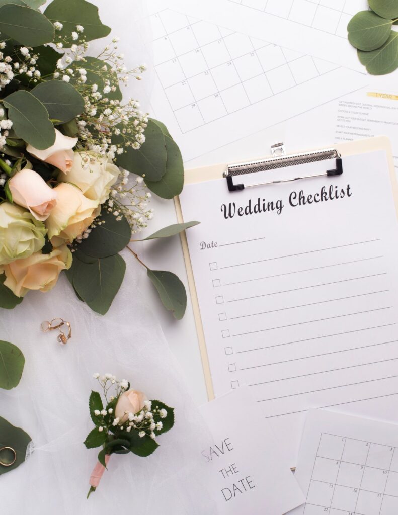 a clipboard with a wedding checklist for an organized DIY wedding