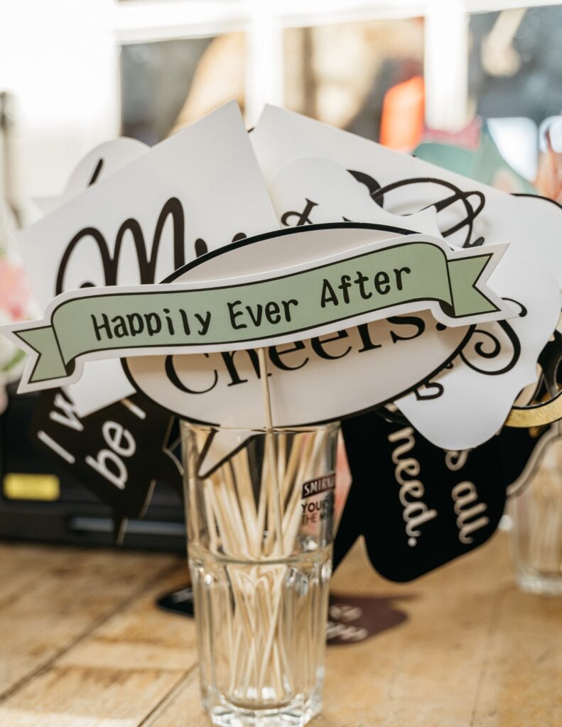 diy signs for a charming wedding photo booth