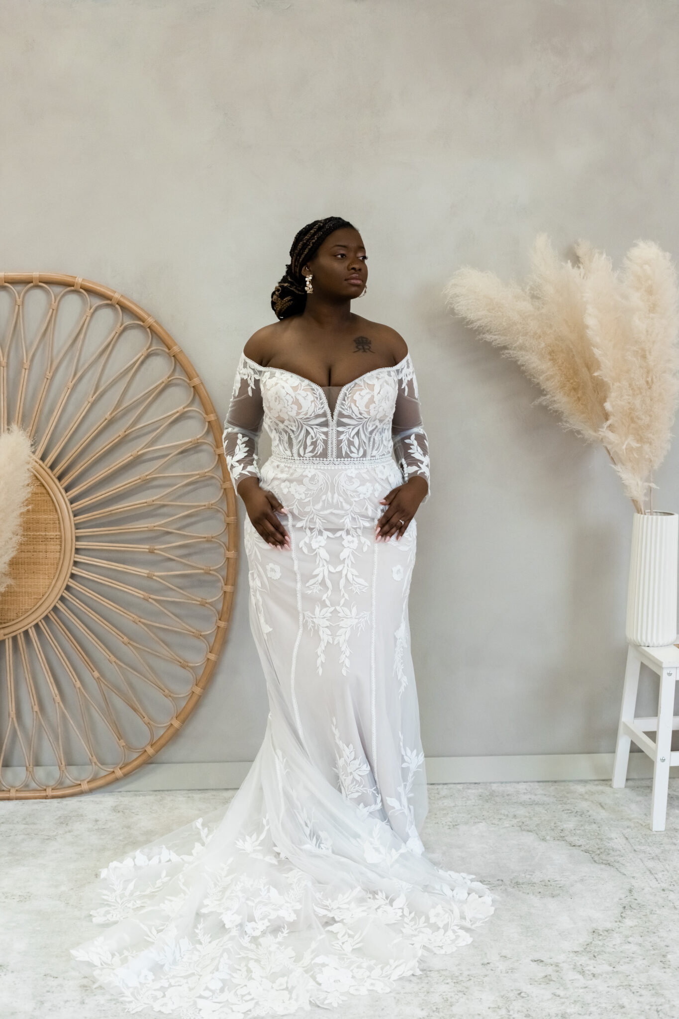 woman wearing wedding dress offered by The Wedding Shoppe