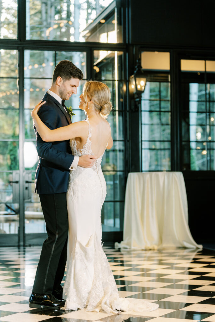 a photo capturing the first dance between newly married husband and wife