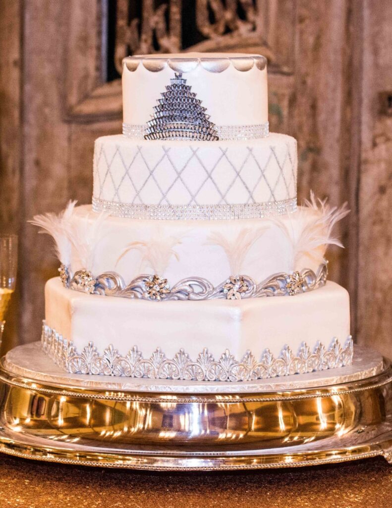Beautiful art deco cake with black, gold, and silver detailing