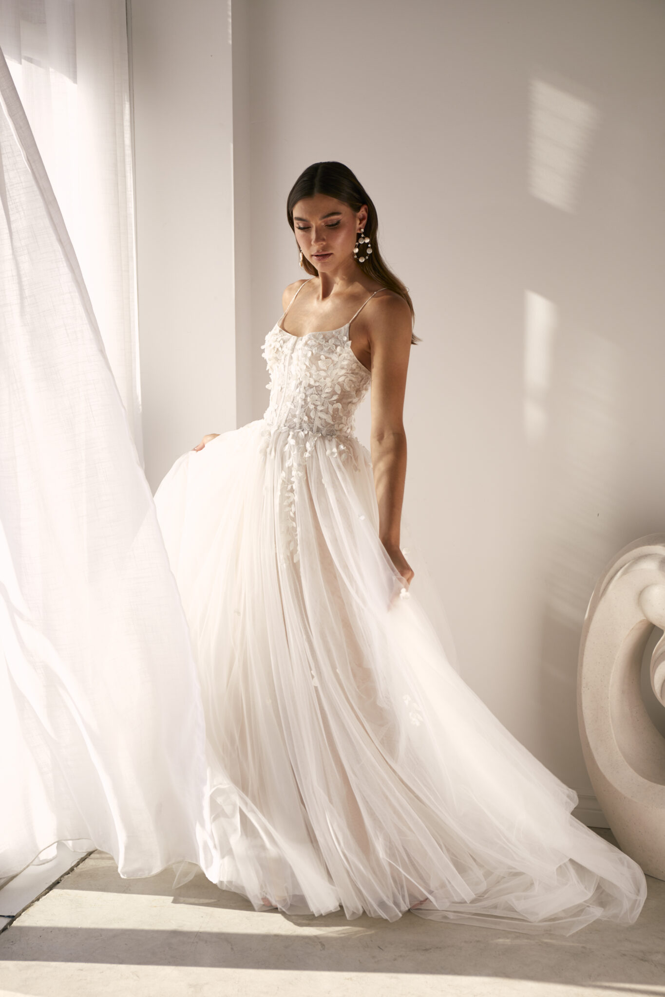 woman wearing Sarah Alouache couture wedding dress