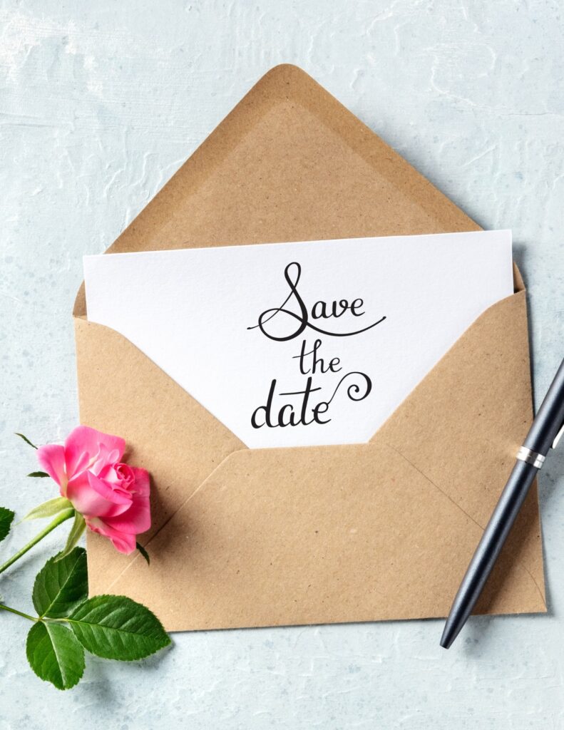 save the date invitation to a wedding in a brown envelope