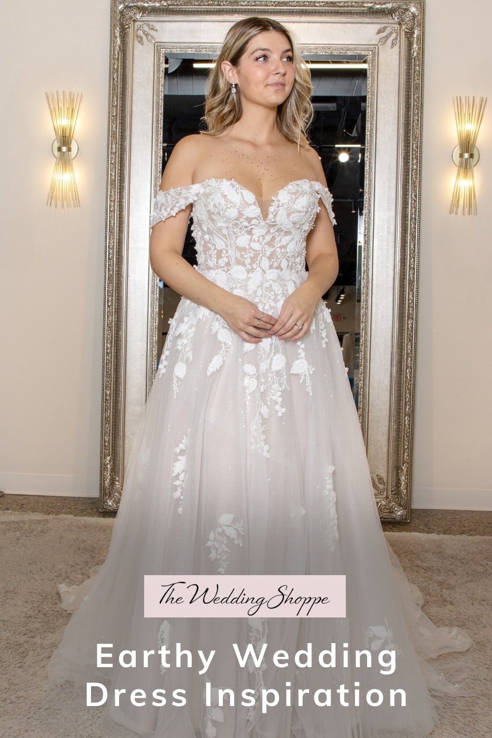 Calise is a sweetheart aline gown with some light sparkle throughout the leafy lace detail. The detachable straps make this a dress with 2 looks in one.