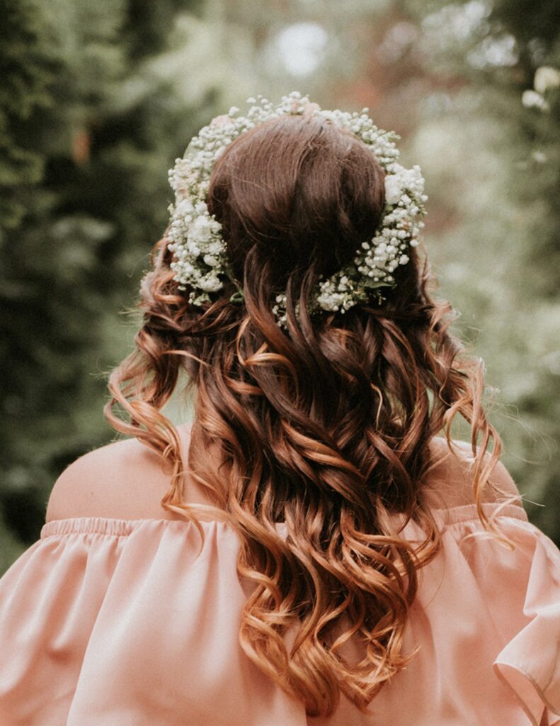 bride wearing her hair in a floral tiara on her wedding day