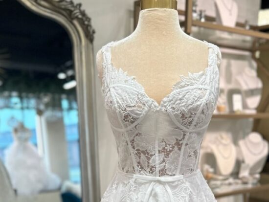 Ttarie is a short wedding dress with a flirty and romantic vibe