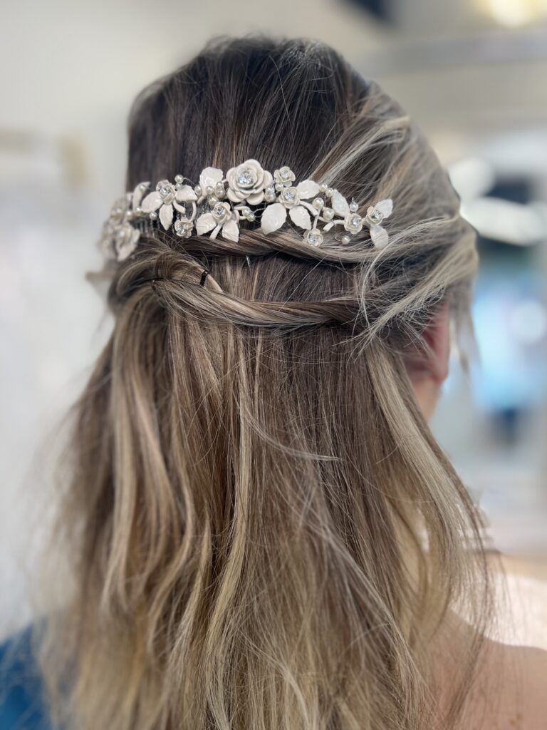 a white and crystal floral tiara for a spring wedding