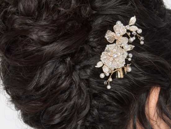 a gold-slotted floral headpiece, perfect for a wedding accessory