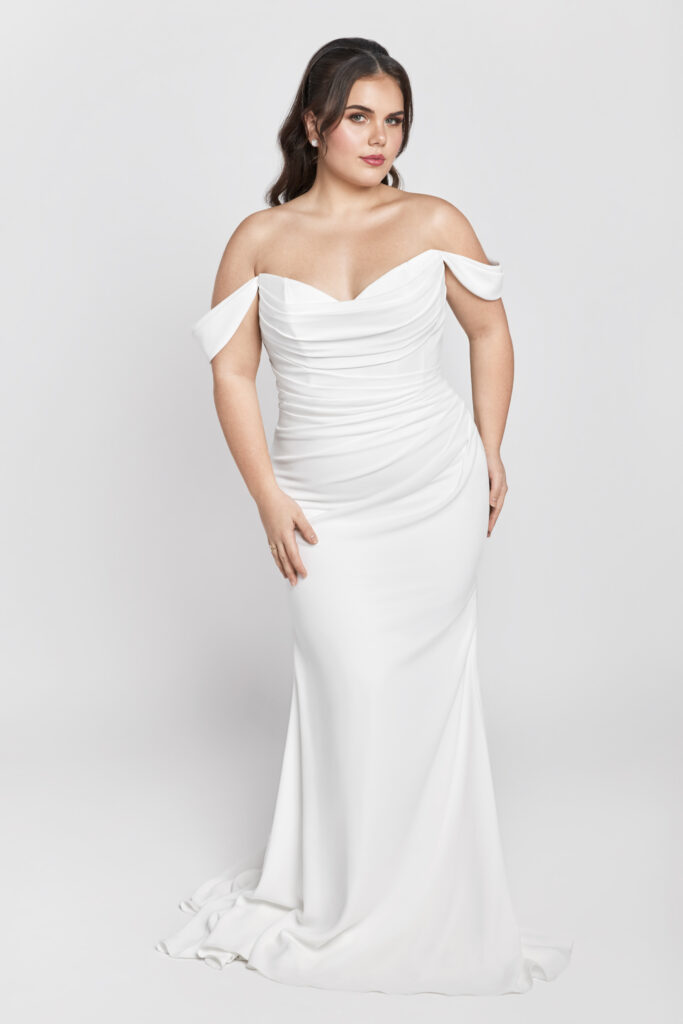 Cal is a simple, elegant gown that still allows for comfort and dancing at your wedding reception