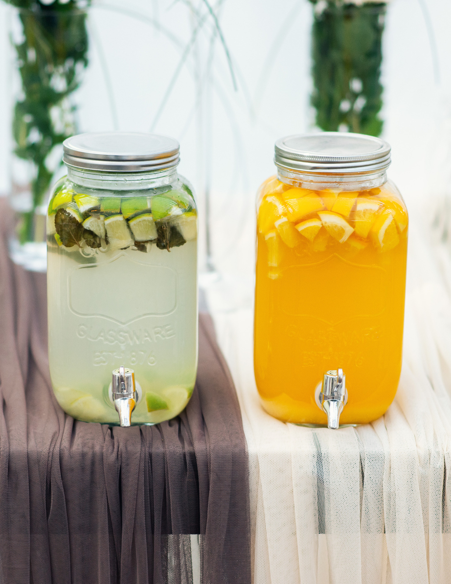 two citrus jars lime and orange juice