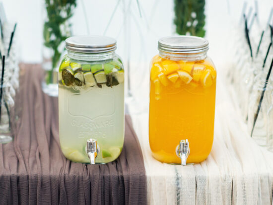 two citrus jars lime and orange juice