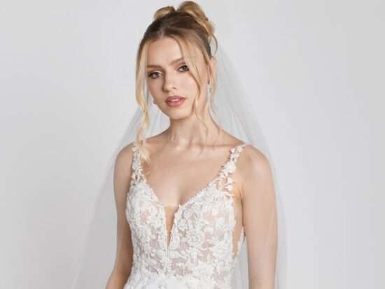 Nelson is an elegant fitted dress for a summer wedding. The elaborate lace train is a great addition to the clean skirt and perfectly accents the beautiful bodice detail.