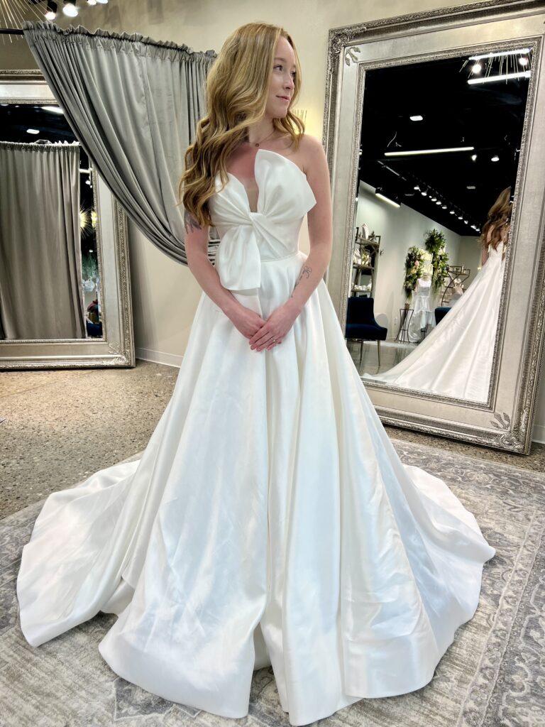 the Grand dress, an a-line gown with mikado and a bodice bow detail