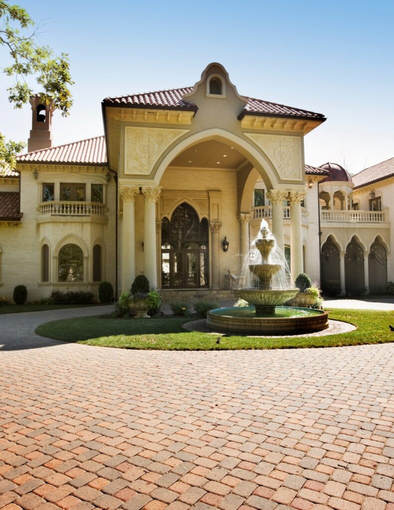 A stunning wedding venue with a fountain out front, ideal for a Bridgerton Wedding