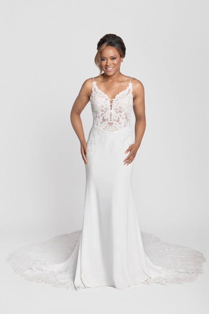 Aiden - a lightweight crepe and lace sheath style gown. It features a stunning lace train and delicate beaded spaghetti straps