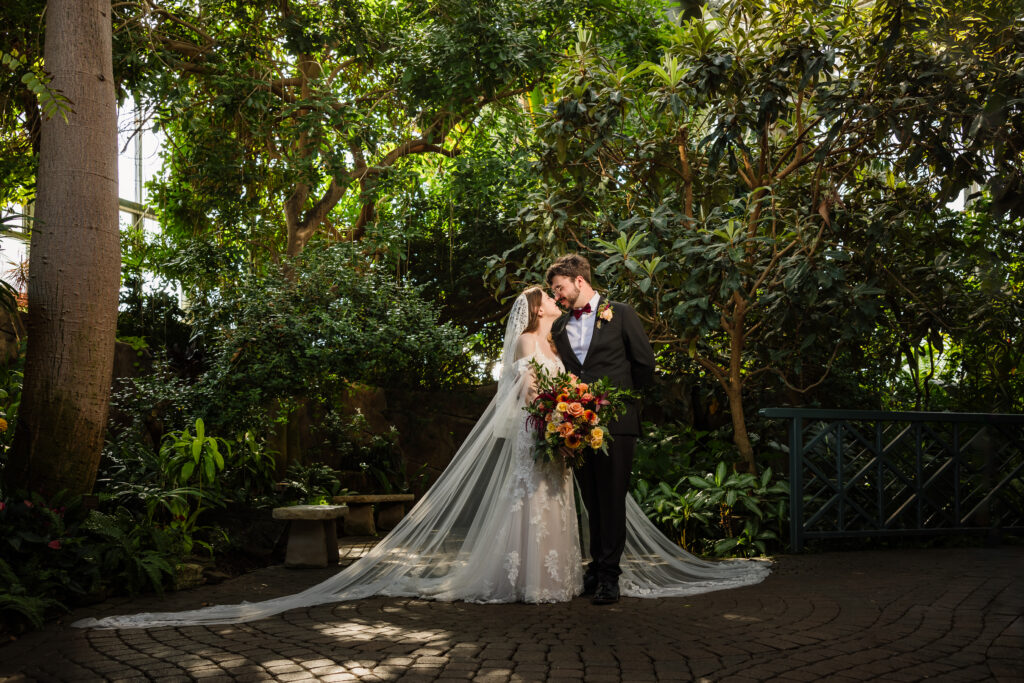 A newly married husband and wife in the Frederick Meijer Gardens