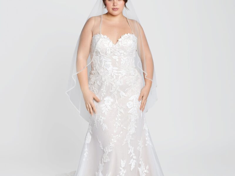 Plus Size bride modeling one of her favorite faerie wedding gowns from The Wedding Shoppe in Berkley, MI.