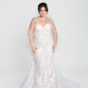 Plus Size bride modeling one of her favorite faerie wedding gowns from The Wedding Shoppe in Berkley, MI.