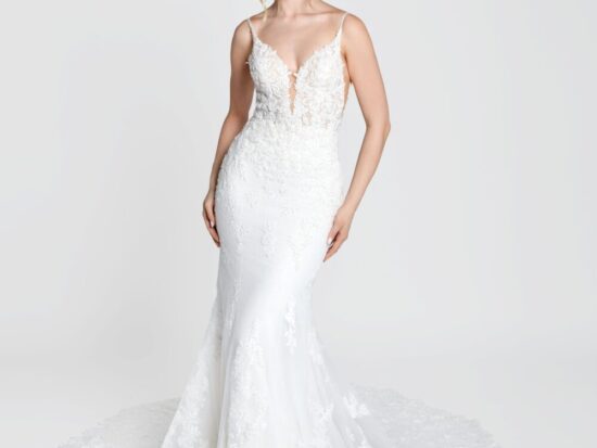 Simple bohemian wedding dress with spaghetti straps and deep v cut bodice with a lace overlay train.