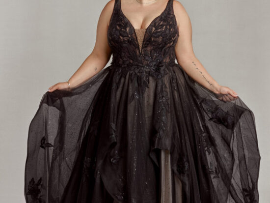 Gorgeous bride to be showing off her black gothic wedding dress with subtle sparkles on the skirt. Just one of the many non traditional plus size wedding dresses from The Wedding Shoppe.