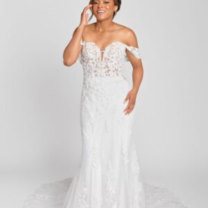 Lovely bride to be wearing a lace, fit and flare wedding dress with a sweetheart neckline, off the shoulder sleeves and a simple, flowing skirt.