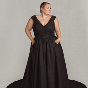 Classic style wedding dress with cap sleeves and v cut neckline. There are subtle black sparkles throughout the gothic wedding dress.