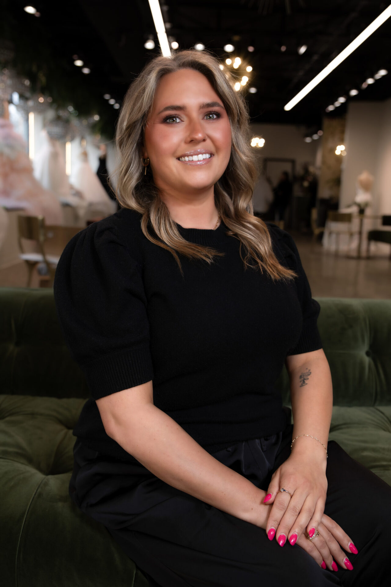 smiling woman in black shirt