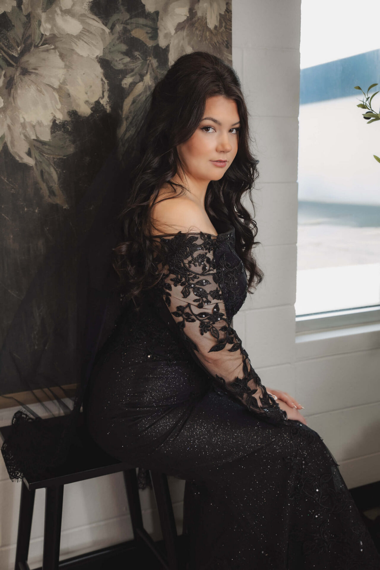 woman in black wedding dress with sleeves